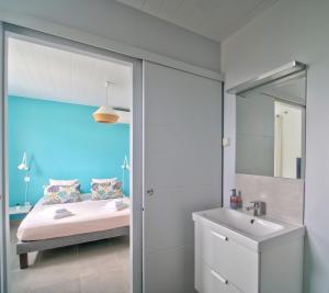 Voodi või voodid majutusasutuse SeaCove & SeaSide Villas, classées 4 étoiles toas