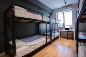 Voodi või voodid majutusasutuse Kantar Hostel toas