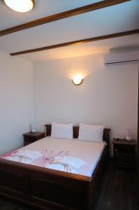 Giường trong phòng chung tại Вила Едем - Villa Edem - Beach Bolata Area