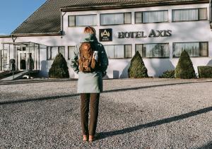 Hosté ubytování Axis Hotel
