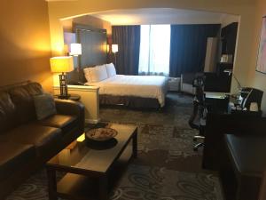 Postelja oz. postelje v sobi nastanitve Holiday Inn Orlando East-UCF Area, an IHG Hotel