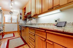 a kitchen with wooden cabinets and a counter top at 4412 Mackinaw in Wilson