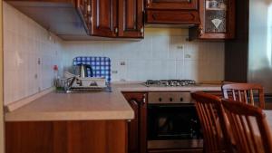Kuchyň nebo kuchyňský kout v ubytování Apartment Luce