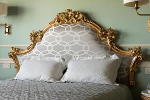 A bed or beds in a room at Villa Cordevigo