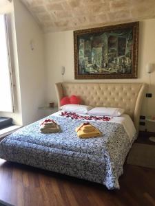 Postel nebo postele na pokoji v ubytování Alla dimora di Chiara Suite and Rooms