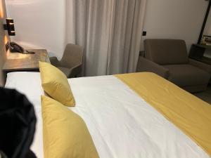 Ein Bett oder Betten in einem Zimmer der Unterkunft HOTEL Boutique ÁNGEL