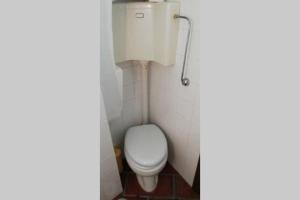 a bathroom with a white toilet in a stall at Monolocale ad un passo dalla chiesa del Carmine in Martina Franca
