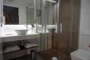 Ein Badezimmer in der Unterkunft HOTEL Boutique ÁNGEL