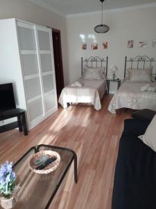 Posteľ alebo postele v izbe v ubytovaní La Casa de Pepa