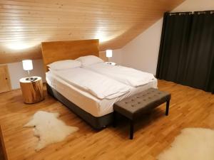 Postel nebo postele na pokoji v ubytování Vila Cedra