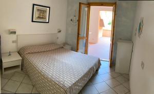 Ένα ή περισσότερα κρεβάτια σε δωμάτιο στο Marta's Holidays Home