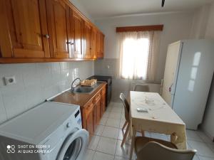 Kuchyň nebo kuchyňský kout v ubytování Snuggery Elegant Apartment