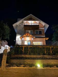 a large house at night with lights on it at Lapônia Hotel Gramado in Gramado