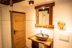 a bathroom with a sink and a mirror at Sailer in Malta