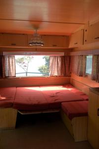 Postelja oz. postelje v sobi nastanitve Camping Alpino - Nature Village