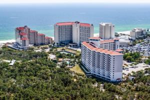 an aerial view of a city with the ocean at TOPS'L Summit VI in Destin