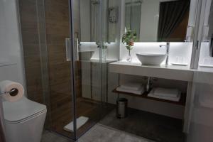 Ein Badezimmer in der Unterkunft HOTEL Boutique ÁNGEL