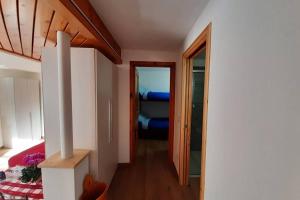 Posteľ alebo postele v izbe v ubytovaní Appartamento vicino al centro da Lori + 3 fotografie