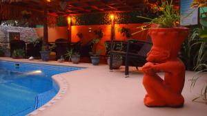 Bazén v ubytování Samara Palm Lodge nebo v jeho okolí