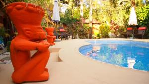Bazén v ubytování Samara Palm Lodge nebo v jeho okolí