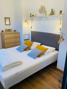Ένα ή περισσότερα κρεβάτια σε δωμάτιο στο L’Annexe