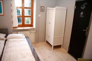 Posteľ alebo postele v izbe v ubytovaní Green Tree Apartment