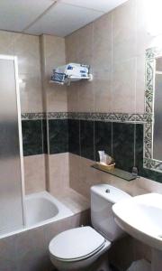 
Een badkamer bij Edelweiss Hotel
