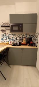 A kitchen or kitchenette at GELSO HOME