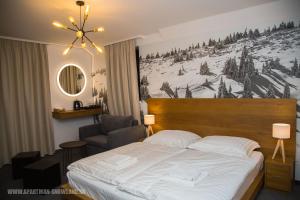 Postel nebo postele na pokoji v ubytování Apartmán u Ričiho-Snowland Valčianska dolina