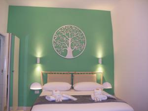 A bed or beds in a room at GELSO HOME