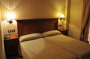Postel nebo postele na pokoji v ubytování Hotel Bocalé