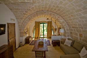 Khu vực ghế ngồi tại Masseria Spina Resort