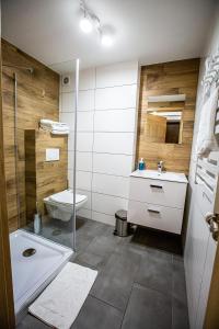 Kúpeľňa v ubytovaní Apartamenty przy skoczni