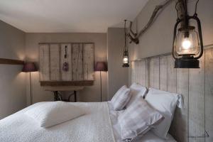 Postel nebo postele na pokoji v ubytování Les Chambres du Vivier, chambres d'hôtes et gîte - à 100m -