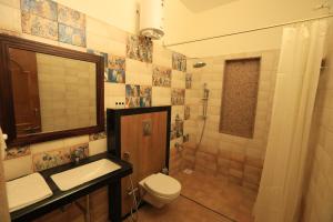 Vannituba majutusasutuses Rangmahal Pushkar by DIV HOSPITALITY