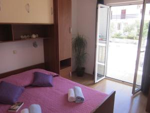 Posteľ alebo postele v izbe v ubytovaní Apartments Kresic