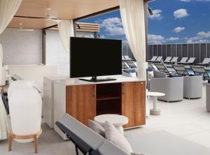 TV a/nebo společenská místnost v ubytování Hyatt Regency Frisco-Dallas