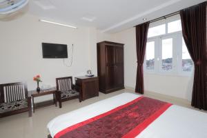 TV a/nebo společenská místnost v ubytování My Hoa 2 Hotel + 21 fotografií
