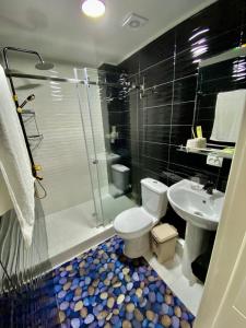 Koupelna v ubytování Cube House Osh