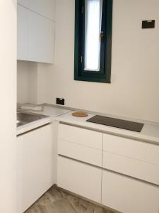 Kuchyň nebo kuchyňský kout v ubytování Apart No 6