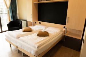Postel nebo postele na pokoji v ubytování Hotel Bungalows Europa