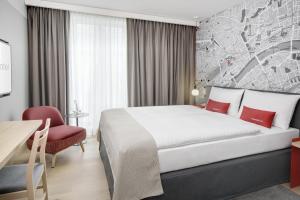 Katil atau katil-katil dalam bilik di IntercityHotel Hildesheim