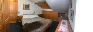 A bed or beds in a room at Chalet Stelvio