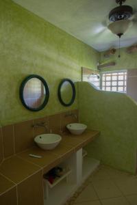 Ванная комната в Casa mar Chambalaca Los Cocos