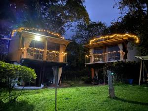 a house with a deck with lights on it at Finca Agualinda in San Francisco