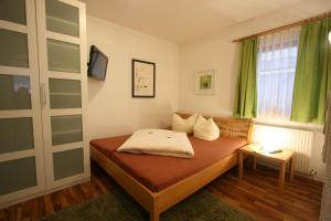 Postel nebo postele na pokoji v ubytování Ferienwohnung Fankhauser