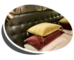 Postel nebo postele na pokoji v ubytování Reenskaug Hotel
