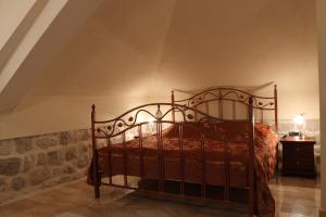 Ένα ή περισσότερα κρεβάτια σε δωμάτιο στο Palace Jelena Rooms