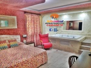 Postel nebo postele na pokoji v ubytování Kitewind Apartamentos Cabarete