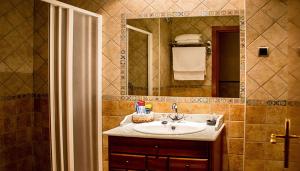 Ванная комната в Hotel Rural El Jardin
